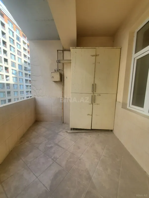 Satılır 4 otaqlı mənzil 164 m²