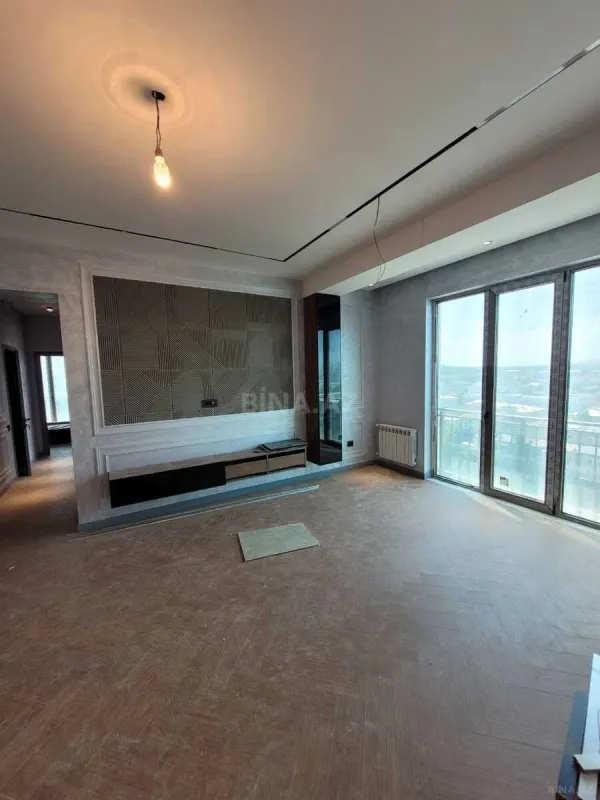 Satılır 4 otaqlı mənzil 100 m²