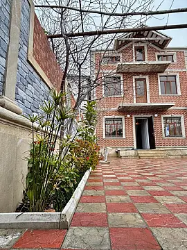 Satılır 7 otaqlı həyət evi 397.7 m²