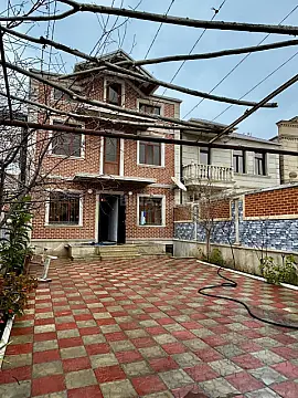 Satılır 7 otaqlı həyət evi 397.7 m²
