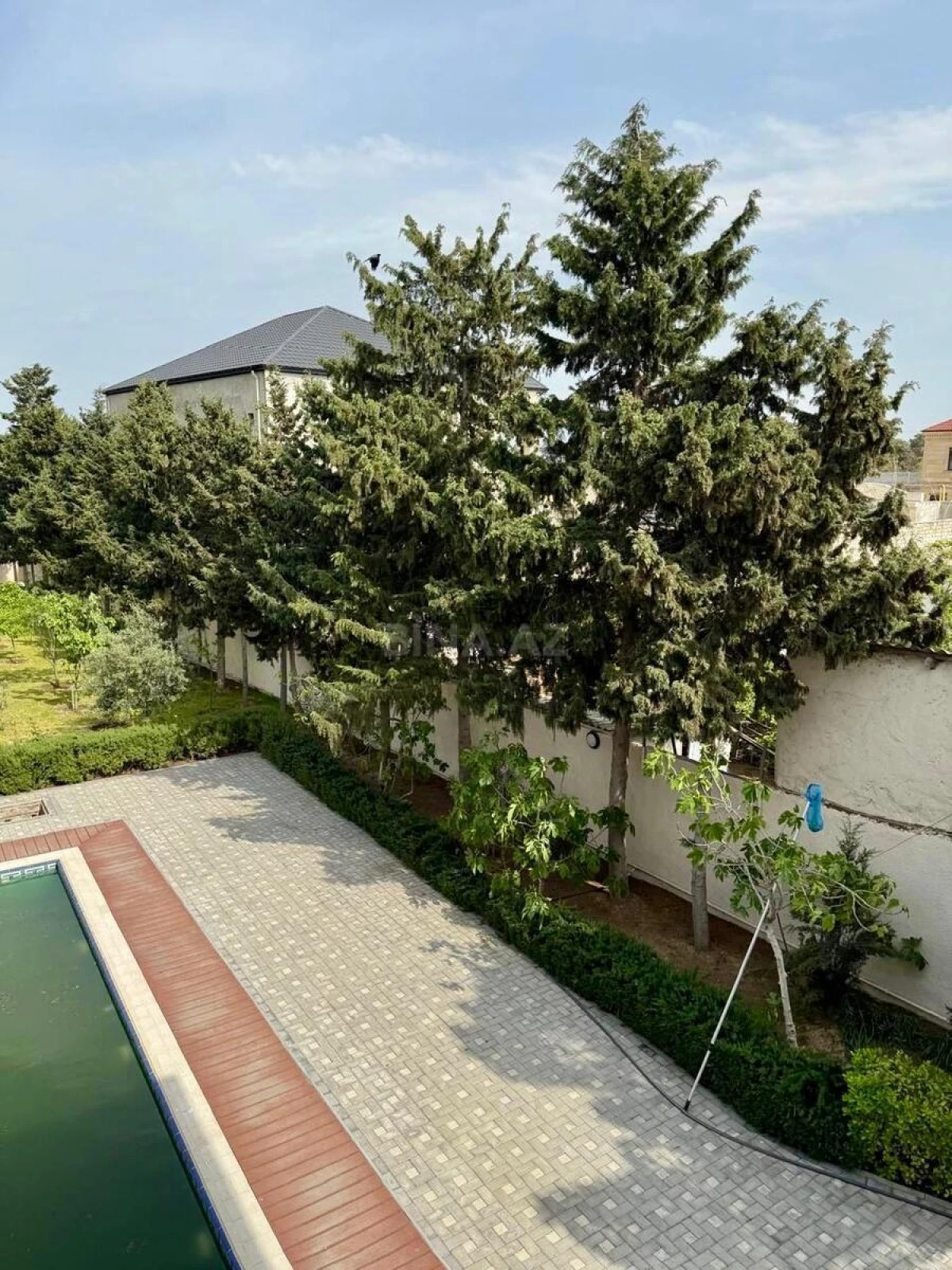 Satılır 7 otaqlı həyət evi 390.7 m²
