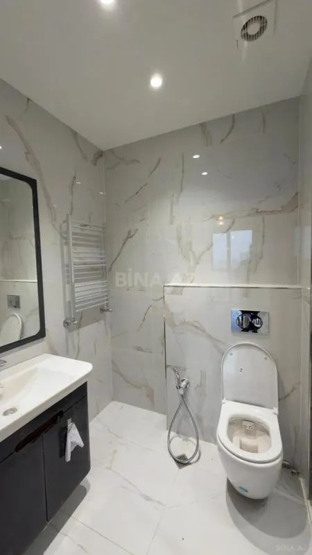 Satılır 4 otaqlı mənzil 124 m²