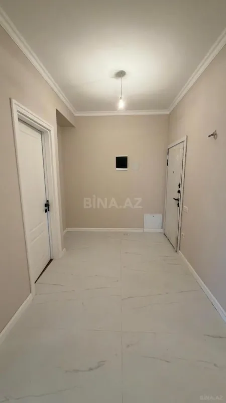 Satılır 4 otaqlı mənzil 124 m²