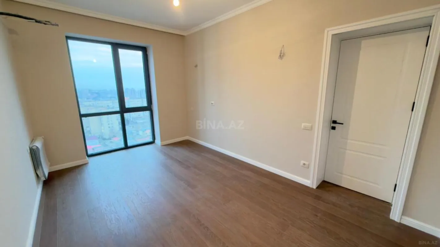 Satılır 4 otaqlı mənzil 124 m²