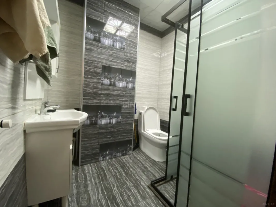 Satılır 4 otaqlı mənzil 107 m²