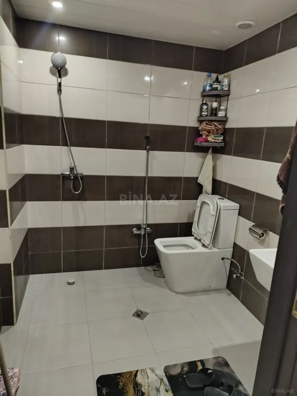 Satılır 2 otaqlı mənzil 58.6 m²