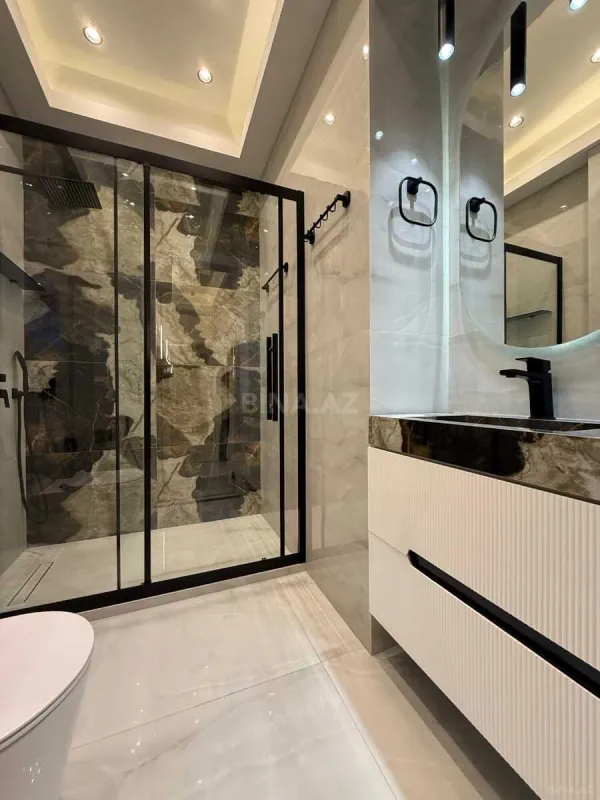 Satılır 4 otaqlı mənzil 195 m²