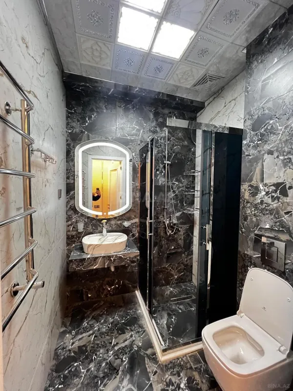 Satılır 4 otaqlı mənzil 165 m²