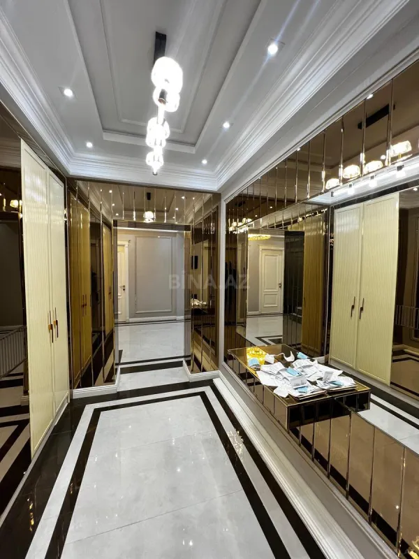 Satılır 4 otaqlı mənzil 165 m²