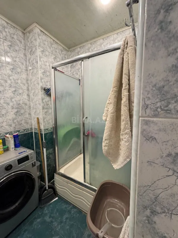 Satılır 4 otaqlı mənzil 132 m²