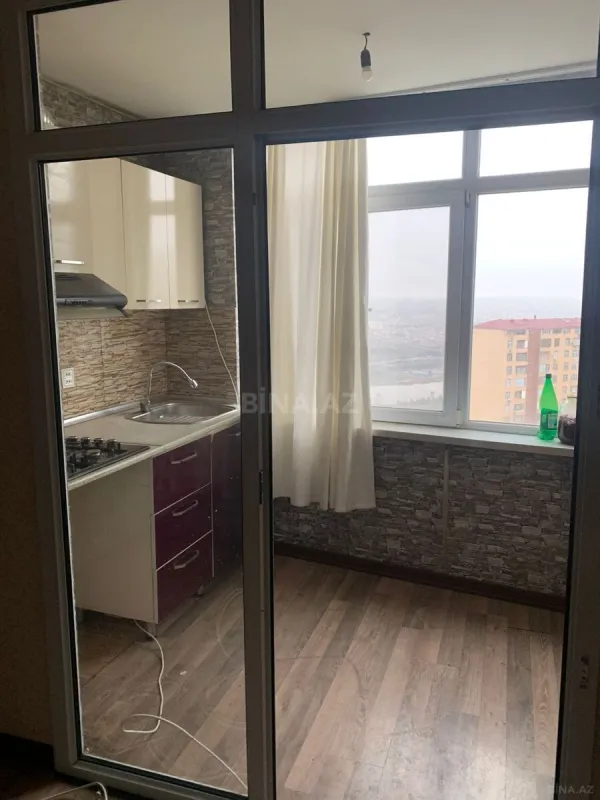 Satılır 2 otaqlı mənzil 56.7 m²