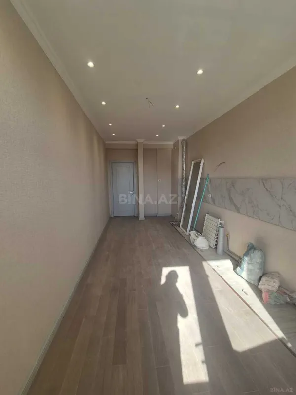 Satılır 3 otaqlı mənzil 124.5 m²