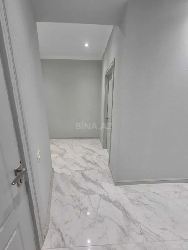 Satılır 3 otaqlı mənzil 124.5 m²