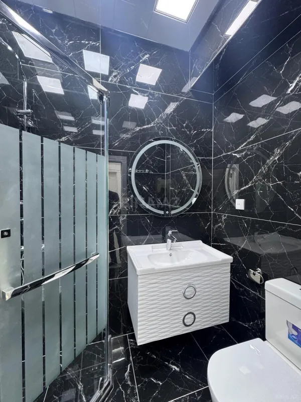 Satılır 4 otaqlı mənzil 138 m²