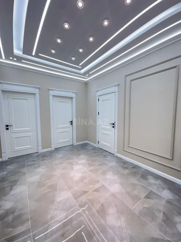 Satılır 4 otaqlı mənzil 138 m²