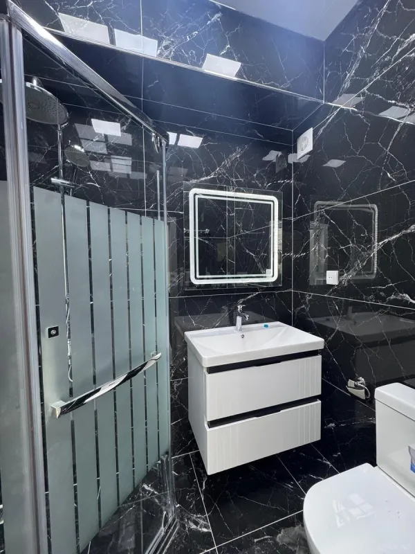 Satılır 4 otaqlı mənzil 138 m²