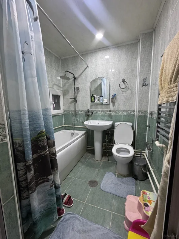 Satılır 4 otaqlı mənzil 113 m²