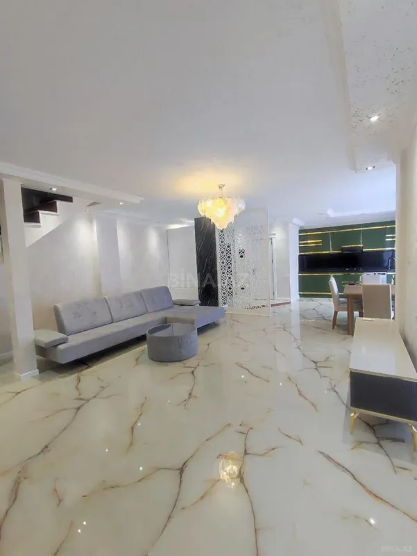 Satılır 4 otaqlı mənzil 130 m²