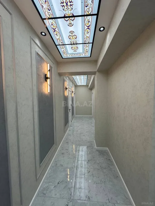 Satılır 4 otaqlı mənzil 155 m²