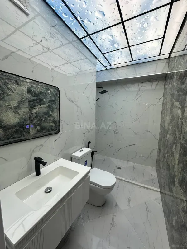 Satılır 4 otaqlı mənzil 155 m²