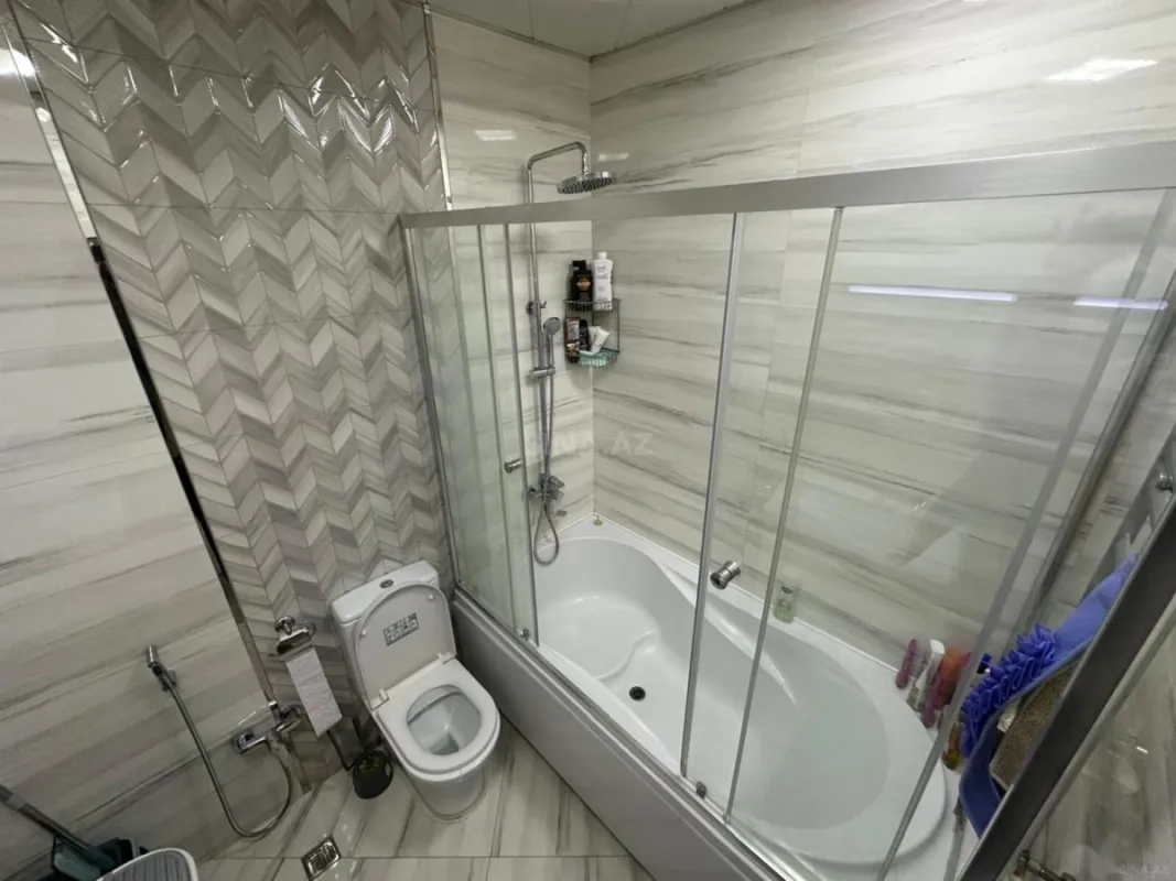 Satılır 4 otaqlı mənzil 139 m²