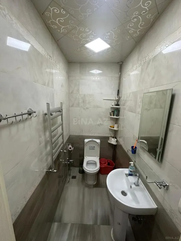 Satılır 4 otaqlı mənzil 139 m²