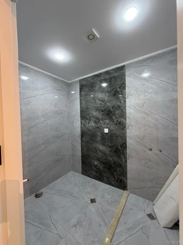 Satılır 4 otaqlı mənzil 140 m²