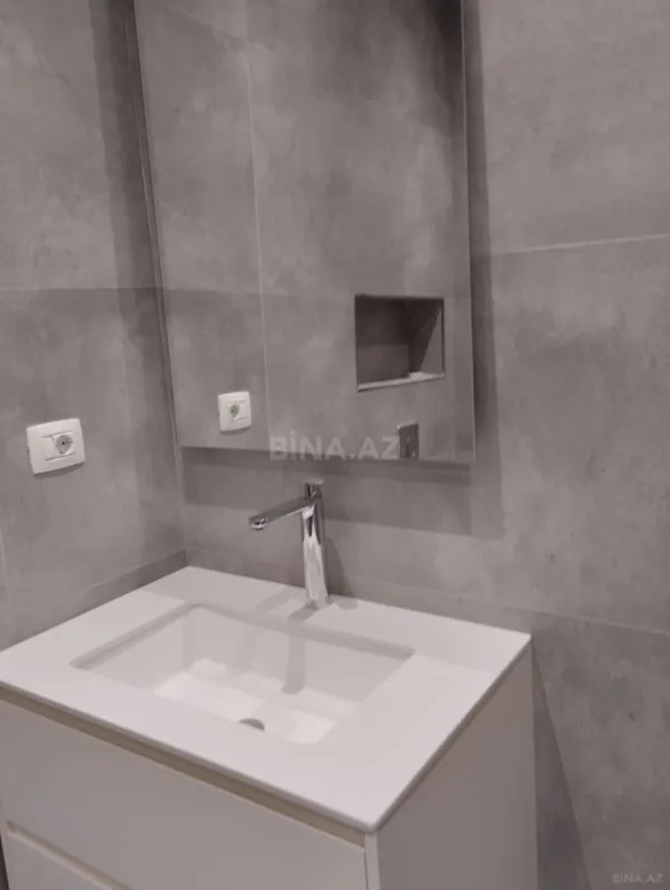 Satılır 2 otaqlı mənzil 56.3 m²