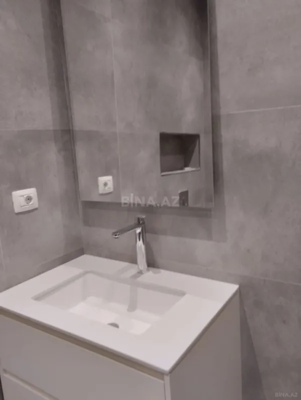 Satılır 2 otaqlı mənzil 56 m²