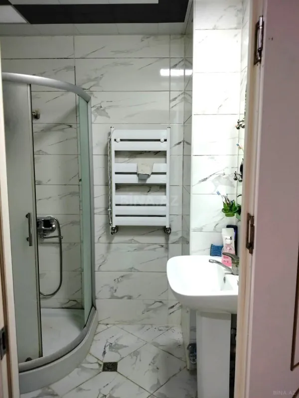 Satılır 4 otaqlı mənzil 150 m²