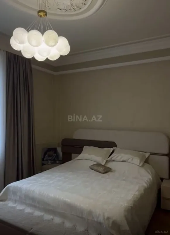 Satılır 4 otaqlı mənzil 153 m²