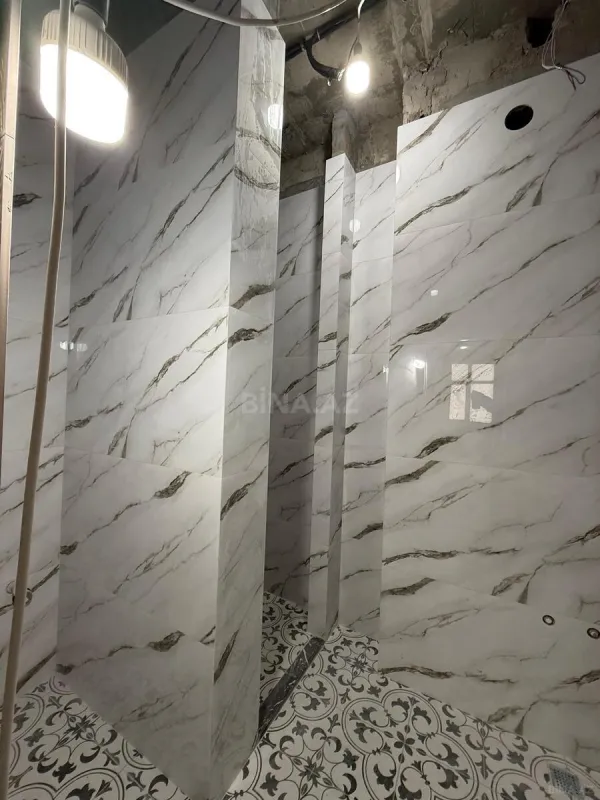 Satılır 4 otaqlı mənzil 152.8 m²