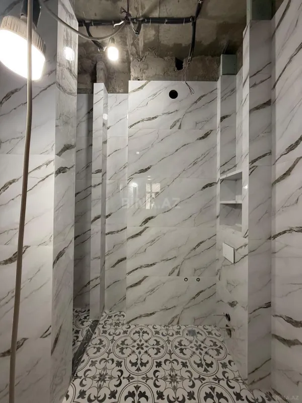 Satılır 4 otaqlı mənzil 152.8 m²