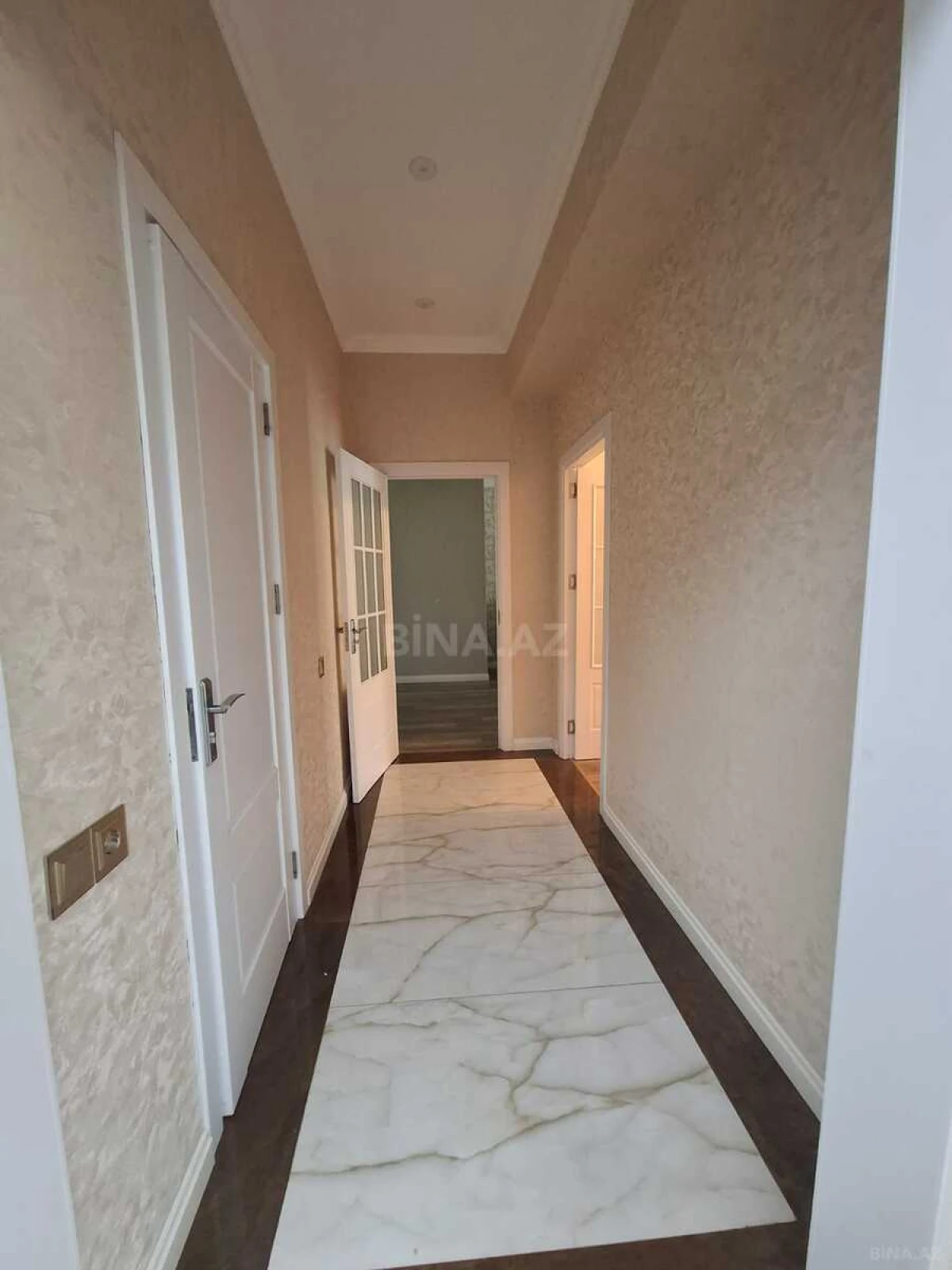 Satılır 4 otaqlı mənzil 154 m²