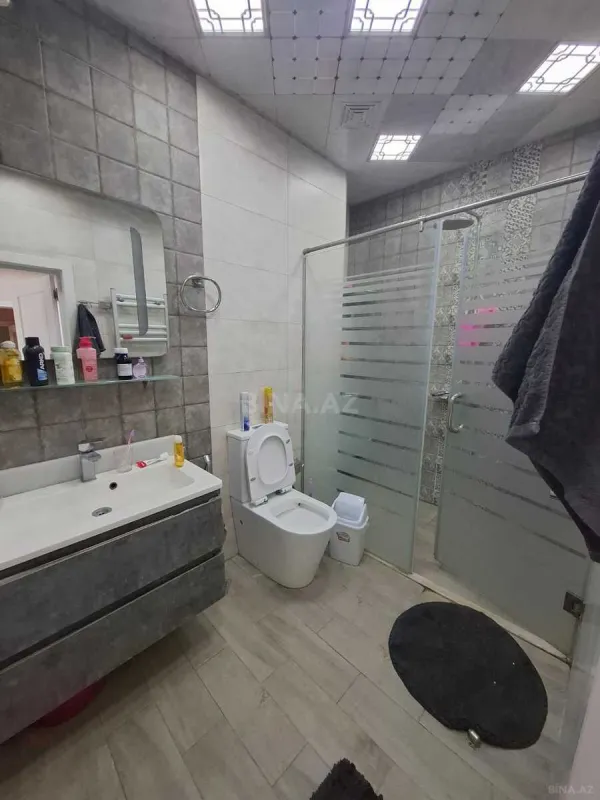 Satılır 4 otaqlı mənzil 154 m²