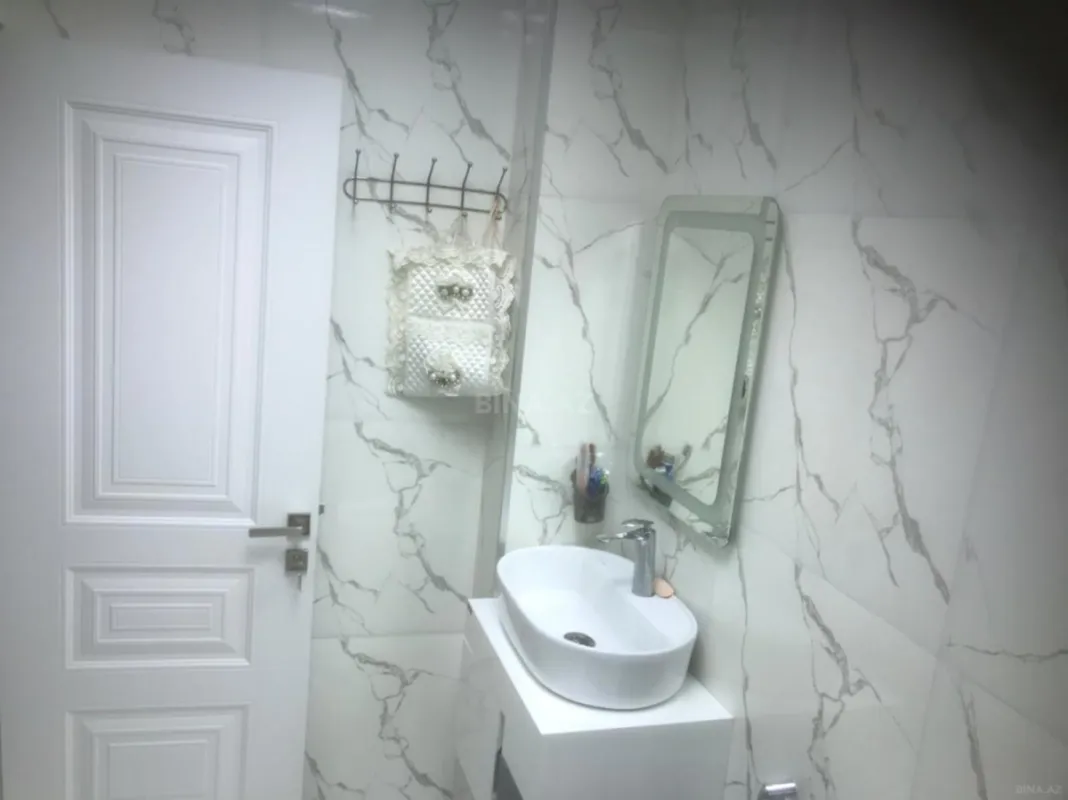 Satılır 4 otaqlı mənzil 95 m²