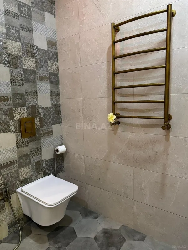 Satılır 4 otaqlı mənzil 157 m²