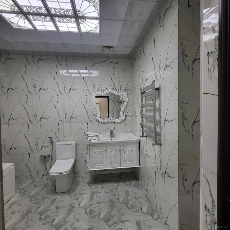 Satılır 3 otaqlı mənzil 141 m²
