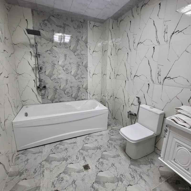 Satılır 3 otaqlı mənzil 141 m²