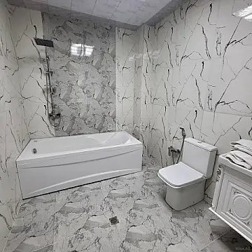 Satılır 3 otaqlı mənzil 141 m²