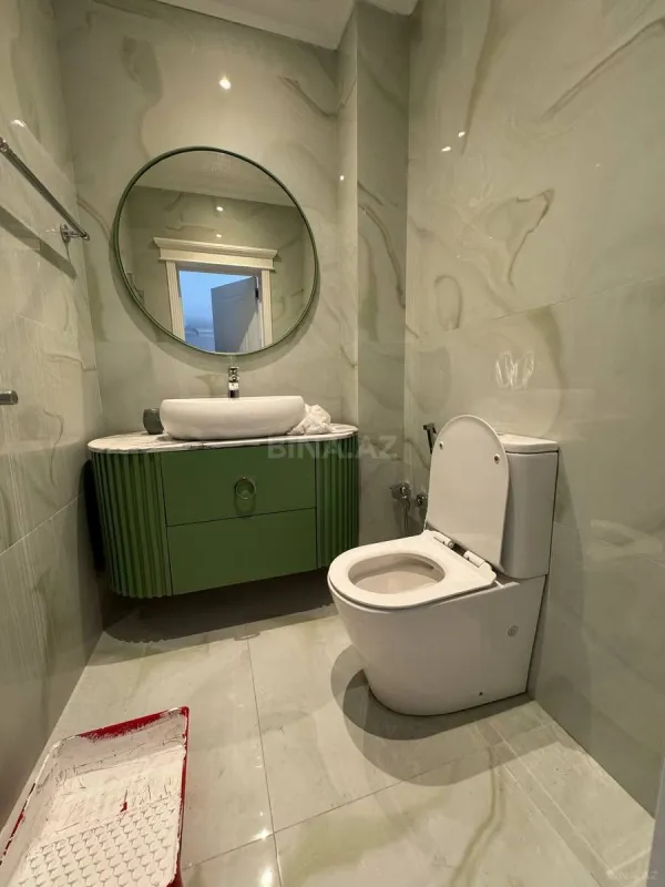 Satılır 4 otaqlı mənzil 130 m²