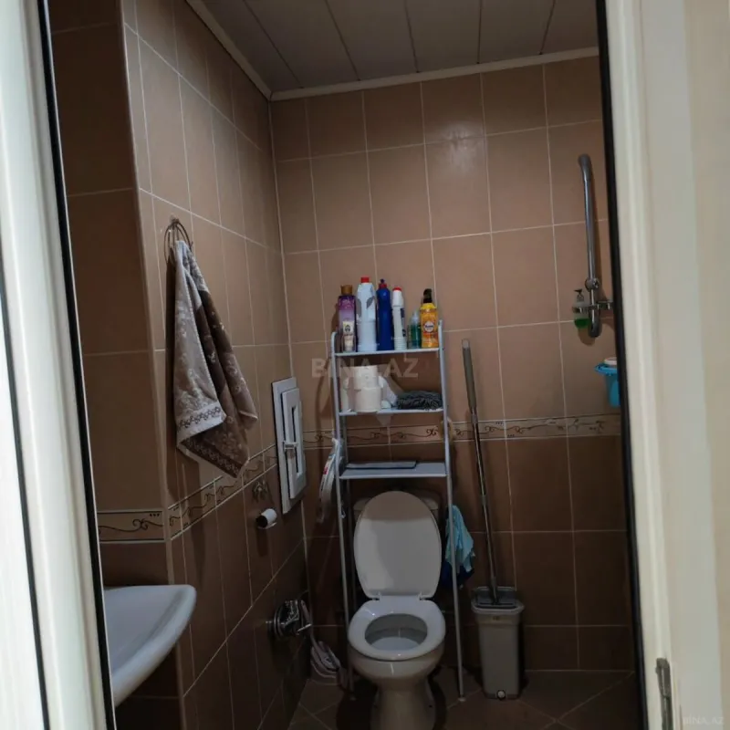 Satılır 4 otaqlı mənzil 141 m²
