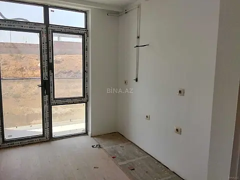 Satılır 2 otaqlı mənzil 63 m²