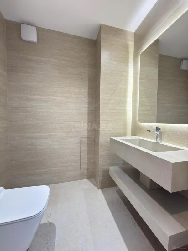 Satılır 4 otaqlı mənzil 142 m²