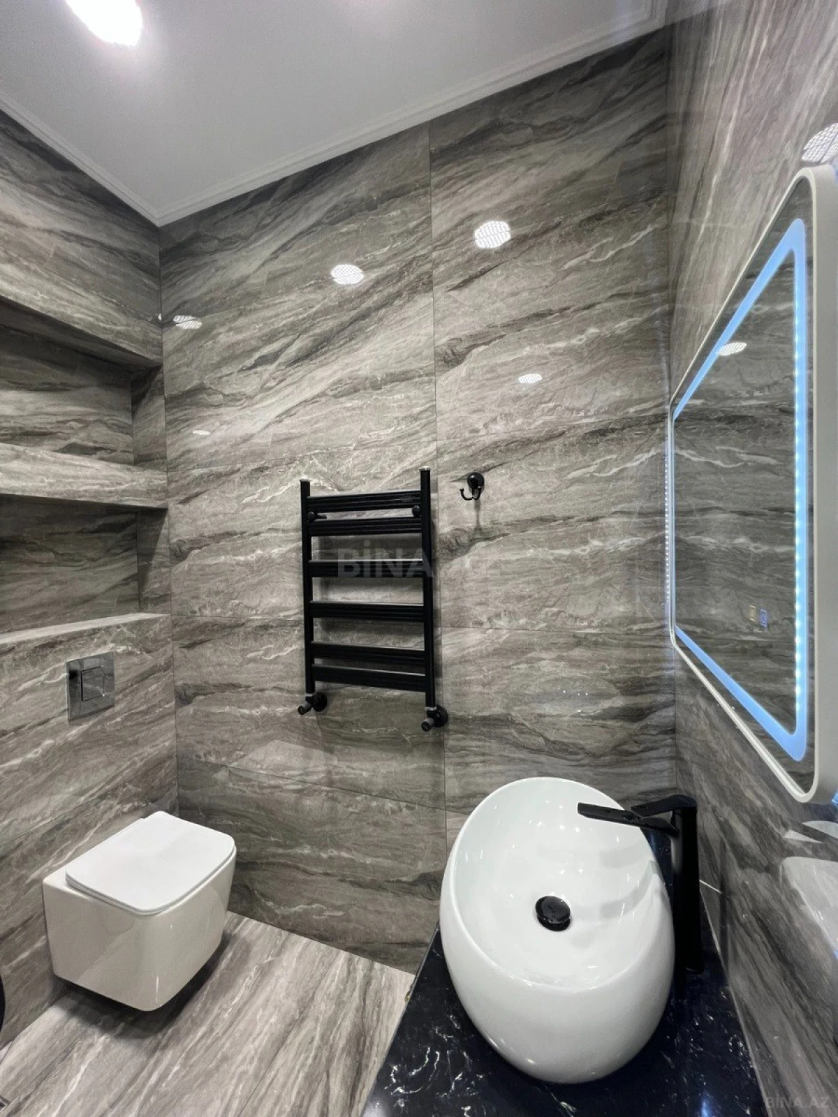 Satılır 4 otaqlı mənzil 144 m²