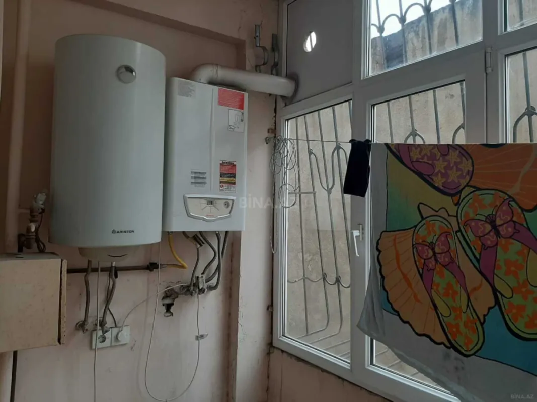 Satılır 4 otaqlı mənzil 150 m²