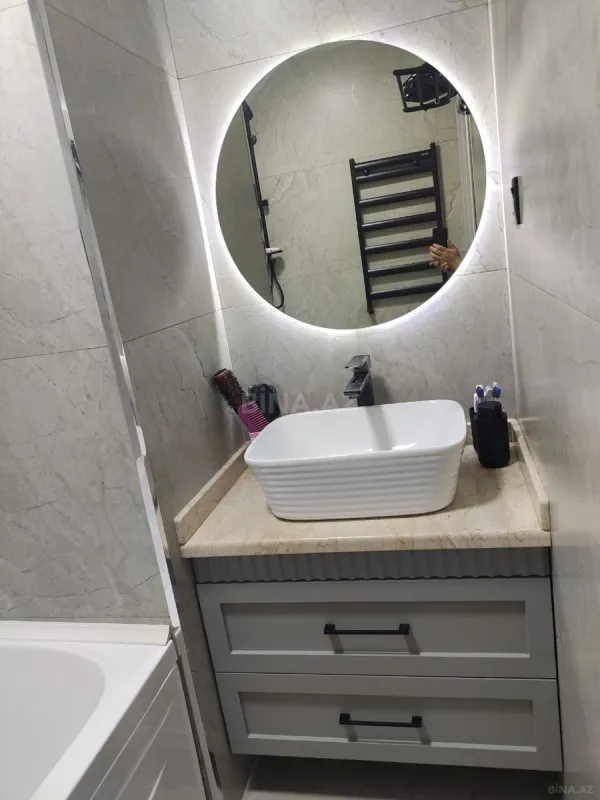 Satılır 4 otaqlı mənzil 100 m²