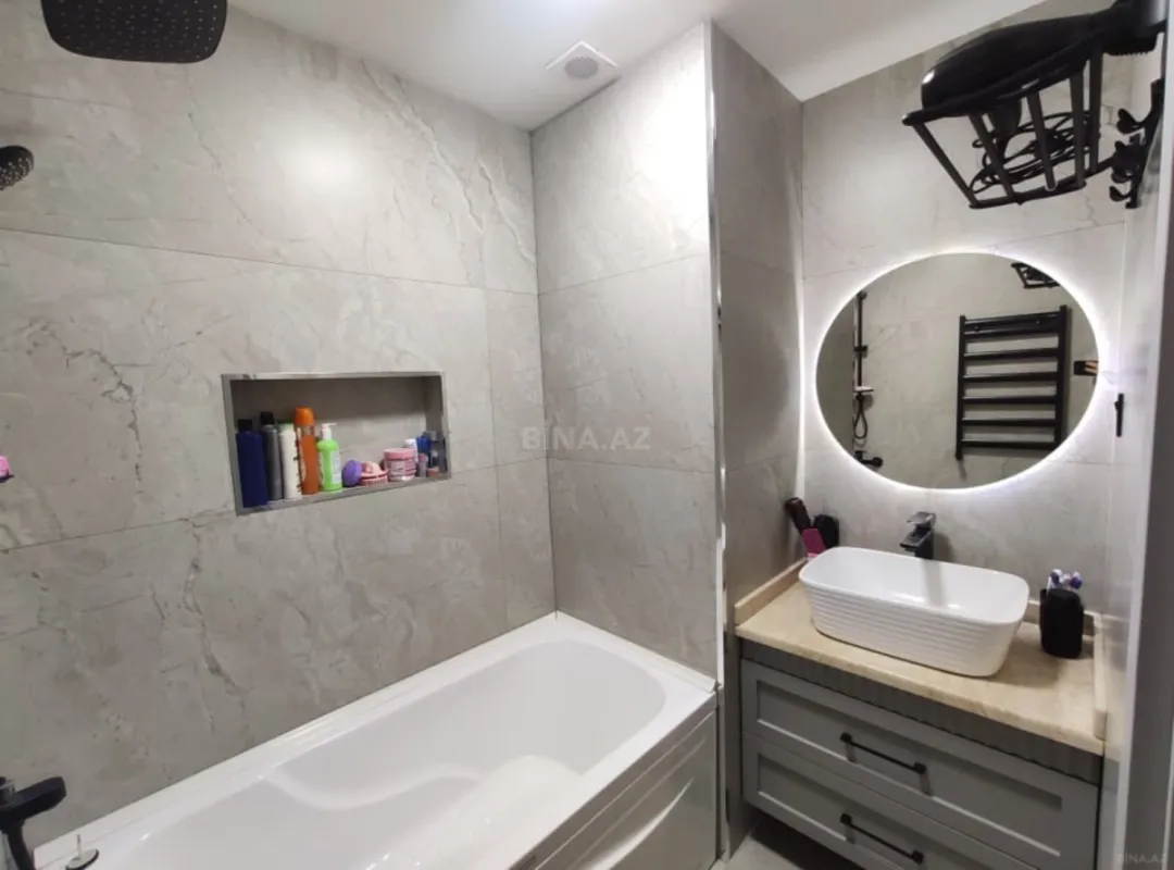 Satılır 4 otaqlı mənzil 100 m²