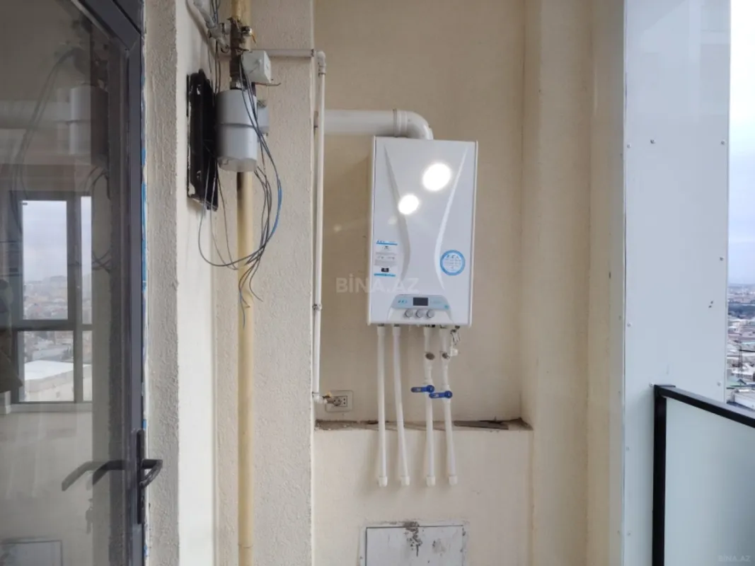 Satılır 4 otaqlı mənzil 121 m²