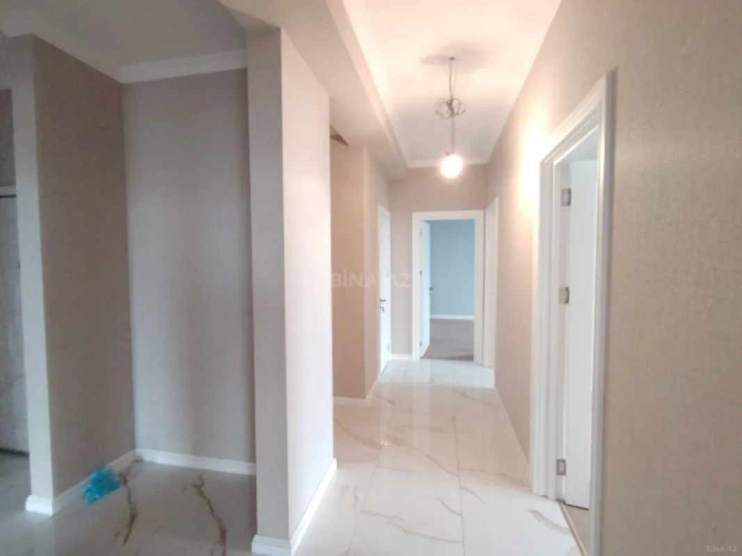 Satılır 4 otaqlı mənzil 121 m²